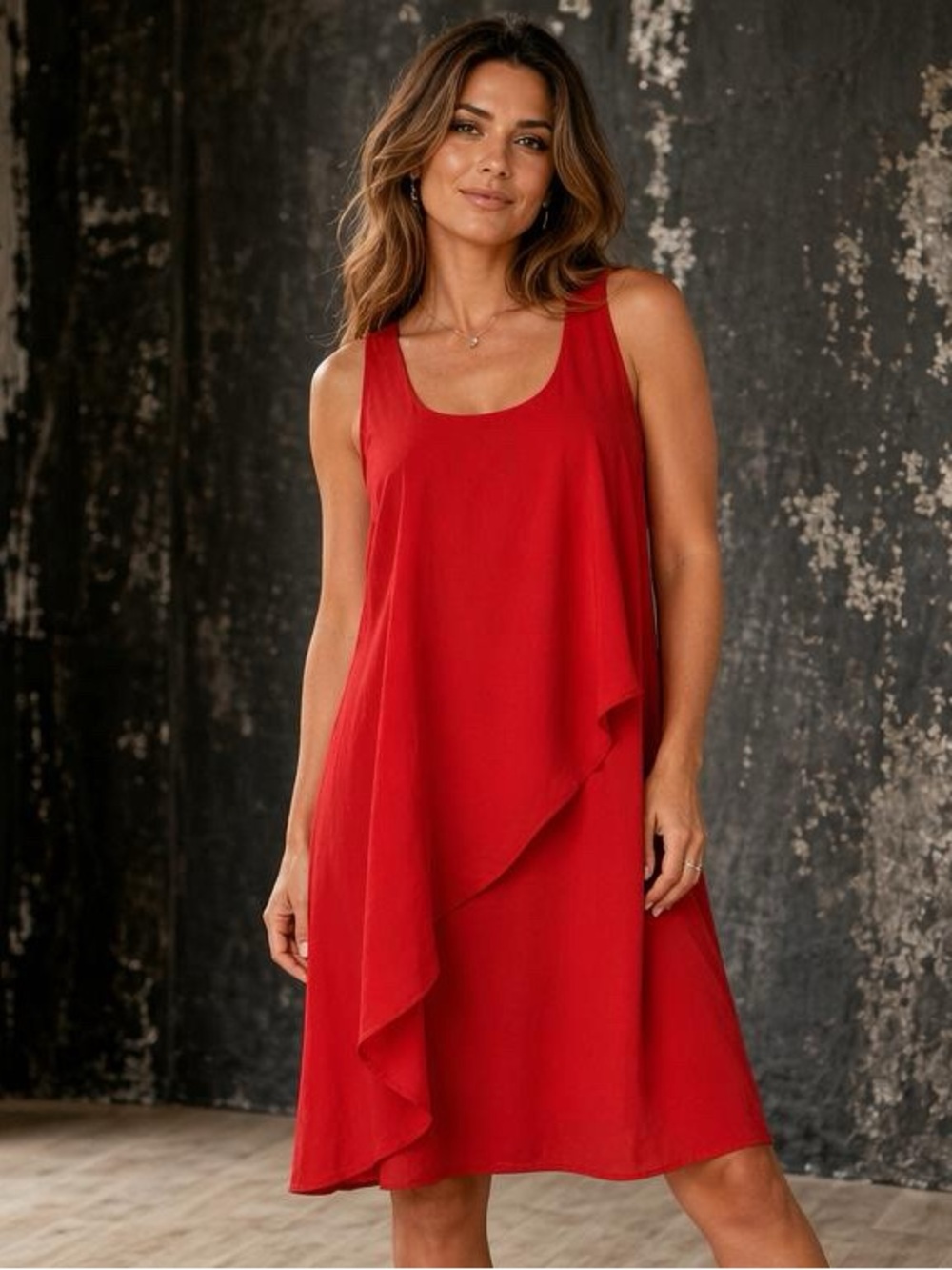 Turn heads with this vibrant red sleeveless dress! Elegant asymmetrical overlay